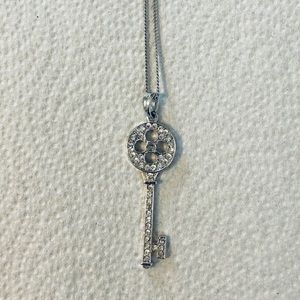 Silver rhinestone key pendant necklace